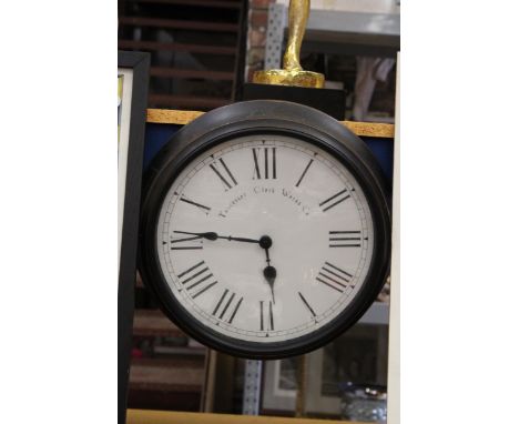 A VINTAGE STYLE BATTERY OPERATED WALL CLOCK, 'TOWCESTER CLOCK WORKS COMPANY', DIAMETER 36CM 