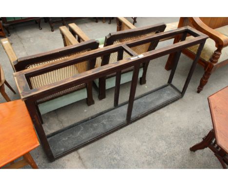 A LARGE CHURCH/VILLAGE HALL TWO SECTION STICK UMBRELLA STAND WITH LEAD DRIP TRAY, 60" WIDE 