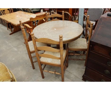 A 37.5" DIAMETER PEDESTAL DINING TABLE AND FOUR LADDER-BACK DINING CHAIRS 