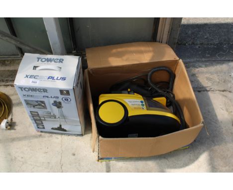 A TOWERPLUS STICK VACUUM AND A STEAM CLEANER 