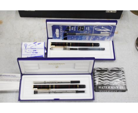 A WATERMAN PARIS LAURENT BLACK FOUNTAIN PEN AND ROLLER BALL PEN SET BOTH CASED WITH REFILLS 