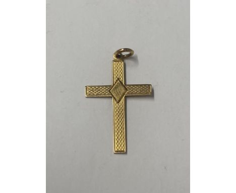 A 9 CARAT GOLD CROSS WITH ENGINE TURNED DECORATION GROSS WEIGHT 0.7 GRAMS 