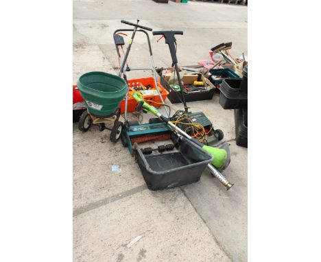 AN ASSORTMENT OF ELECTRIC GARDEN TOOLS TO INCLUDE TWO LAWN RAKES AND A STRIMMER ETC 