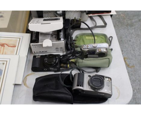 THREE CAMERAS TO INCLUDE A PANASONIC, LUMIX TZ70 AS NEW IN BOX, A PANASONIC DMC-TZ3 IN FABRIC POUCH AND A MINOLTA FREEDOM ZOO