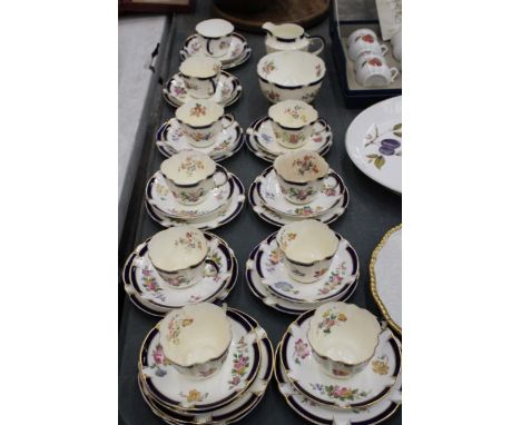 A GEORGE JONES CRESCENT WARE TEA SET TO INCLUDE A CREAM JUG, SUGAR BOWL, CUPS, SAUCERS AND SIDE PLATES 