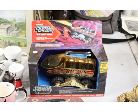 A BOXED 4X4 ROBOT RIDER PLUS A VINTAGE LEVER ACTION TOY CAR 