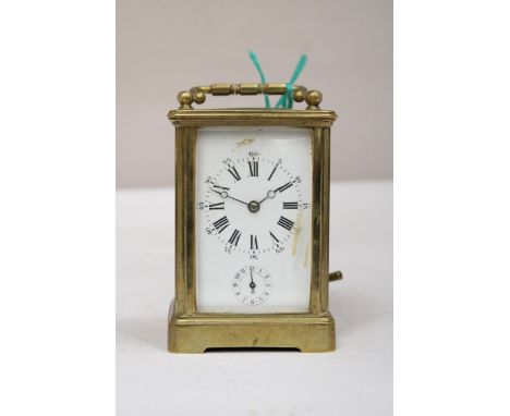 AN AIG LE REVEIL CARRIAGE CLOCK WITH FACETTED GLASS PANELS NO. 12685 WITH KEY 