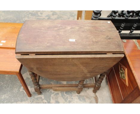 A MID 20TH CENTURY OAK GATE-LEG TABLE ON BOBBIN TURNED LEGS, 40.5" X 29" OPENED 