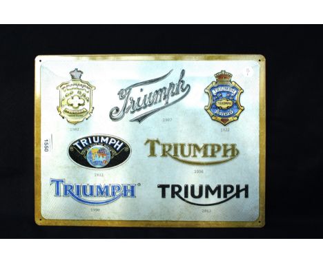 AN ENAMEL TRIUMPH SIGN 