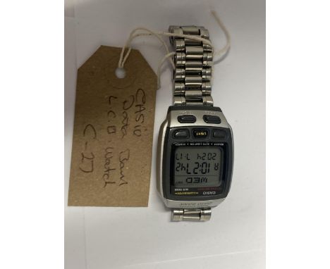 A CASIO MULTI LINGUAL DATA BANK LCD WRIST WATCH SEEN WORKING BUT NO WARRANTY 