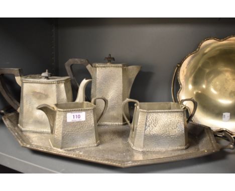 A 1930's Craftsman Sheffield Pewter part tea set with tray, milk, teapot and water jug.