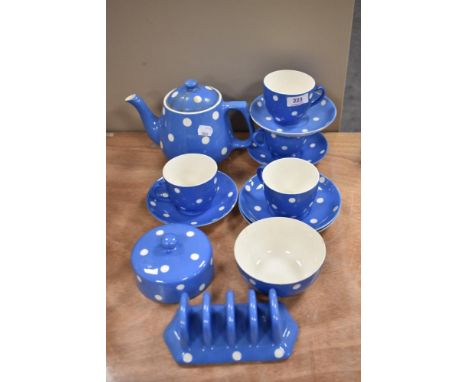 An early 20th century T G Green Blue Domino Polka Dot pattern part tea service teapot having damage and repairs.