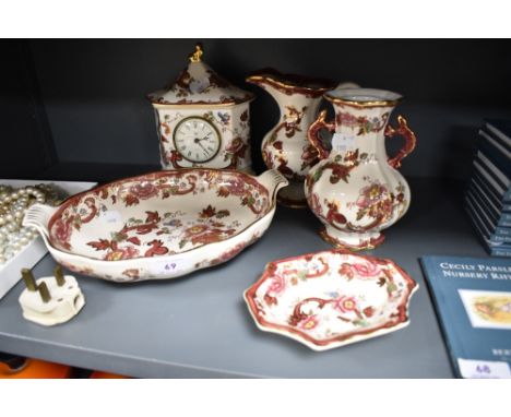 A selection of Masons Mandalay Red pattern ceramics including a clock, vase, water jug and bowls.
