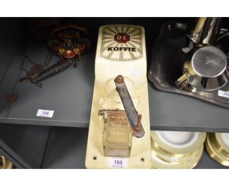 A Mid Century French wall mounted coffee grinder.