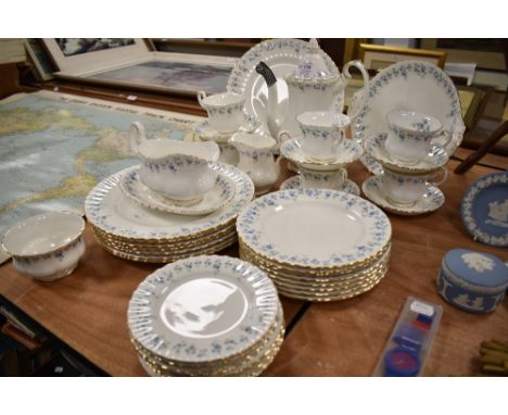 A modern Royal Albert Memory Lane part tea and dinner service, including teapot, dinner plates and tea cups and saucers. Bein