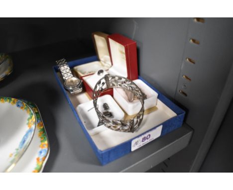 A small selection of silver and white metal jewellery including two pairs of stud earrings, a band ring, Turkish bangle havin