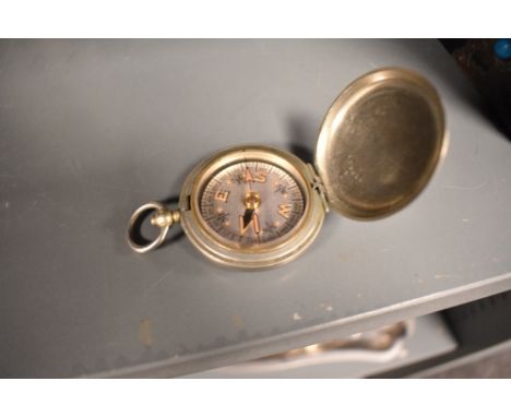 An early 20th century Dennison 1918 military compass.