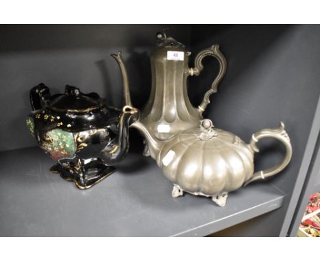 An antique pumpkin form pewter tea pot with a similar coffee pot and a Victorian teapot having a small chip to spout.