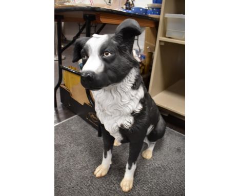 A life size replica model of a Collie sheep dog.