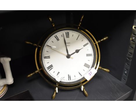 A mid century Metamec sailors ships wheel design clock.