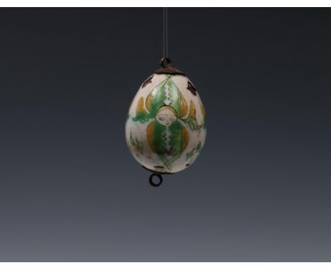 Armenia, Kutahya ceramic egg, 18th-19th century with decor in green, yellow, brown and black with three seraphimand six cross