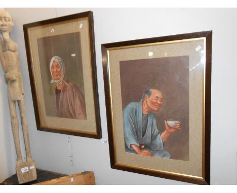 A pair of framed and glazed portrait paintings, one signed Ryuko