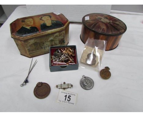 2 vintage tins and contents including badges, pins, costume jewellery etc