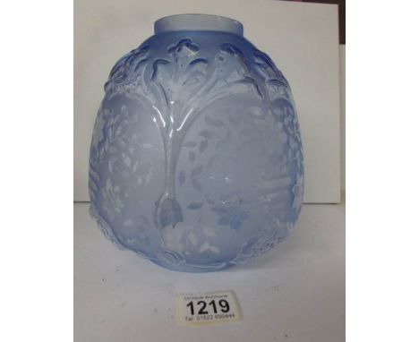 A modern glass oil lamp shade