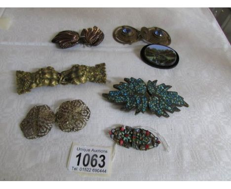 A collection of vintage belt buckles