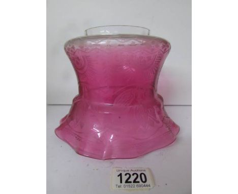 A Victorian cranberry glass acid etched oil lamp shade
