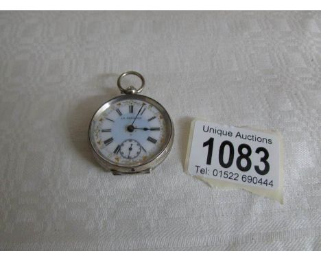 A ladies silver fob watch with enamel dial, in working order