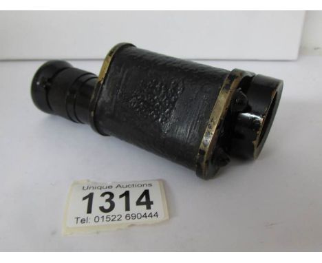 A WW2 British Army officer's Bino Prism monocular sighting scope