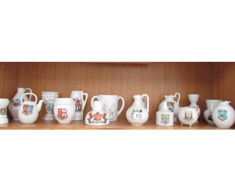 16 pieces of Goss crested china including Blackpool tankard featuring ghoul door knocker, Melrose cup, St. Tudno;s church fon