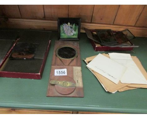 A interesting collection of magic lantern slides and glass negatives