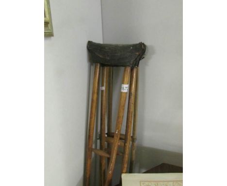 2 pairs of vintage wooden crutches