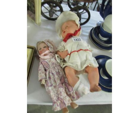 2 vintage dolls
