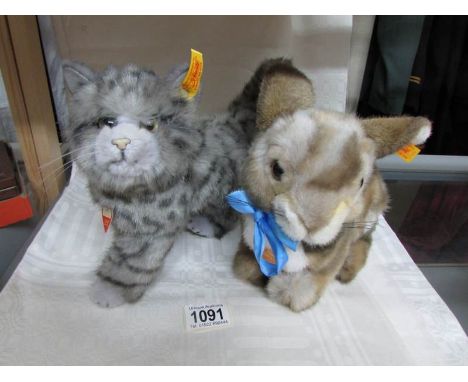 A Steiff 'Putsi' rabbit and a Steiff Whiskas cat