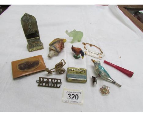 A mixed lot including brass match striker, 'jade' elephant etc