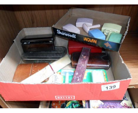 A box of vintage razors etc