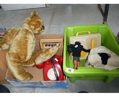 A mixed lot of toys including Teddy bear, action man, Fisher Price etc together with a red retro telephone