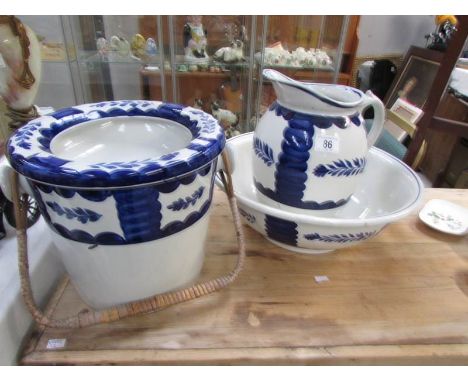 A ceramic toilet set comprising jug, basin and slop pail