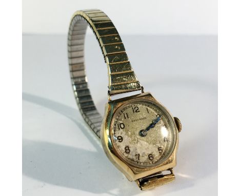 A vintage gold cased wrist watch, Crusaderer