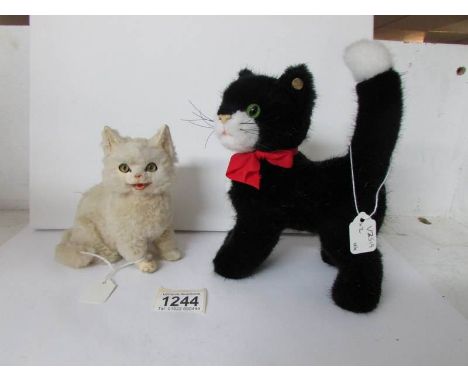 A Steiff cat and an antique plush cat