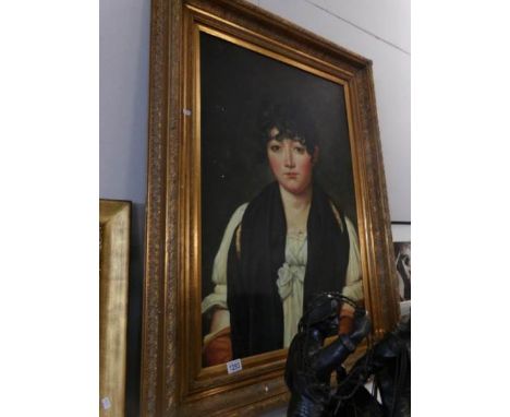 A large gilt framed oil on canvas portrait of a lady
