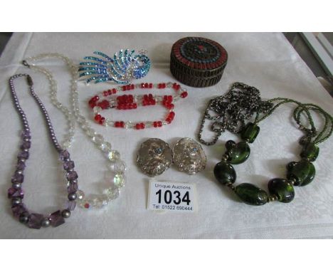 A mixed lot of costume jewellery and a trinket pot