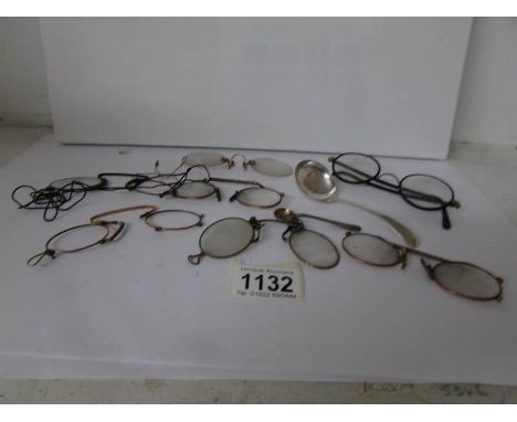 A collection of vintage pinc nez, 2 silver spoons etc