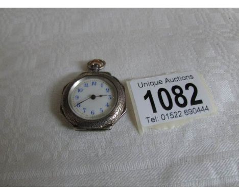 A ladies silver fob watch with enamel dial, in working order