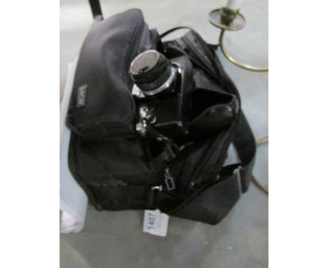 An Olympus camera and accessories
