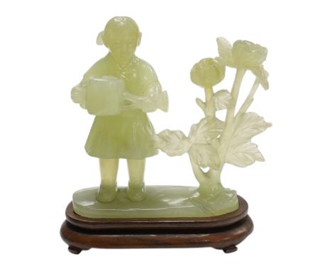 A Chinese green bowenite jade figure on hardwood stand, 14.5cm. Condition - good