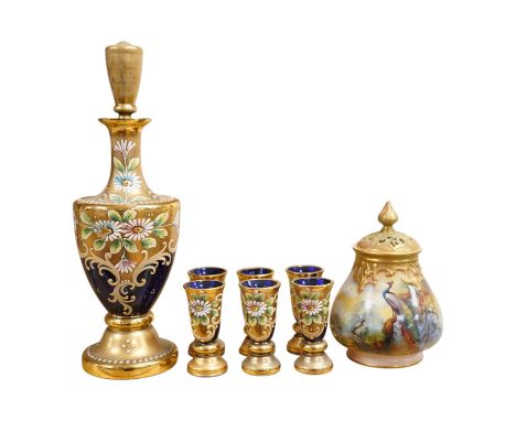 A Royal Worcester peacock painted jar and cover and a Bohemian blue glass decanter and six glasses, with gilt and enamel deco